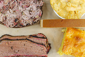 Brisket and pulled pork with cornbread and mac n cheese from Klingers BBQ